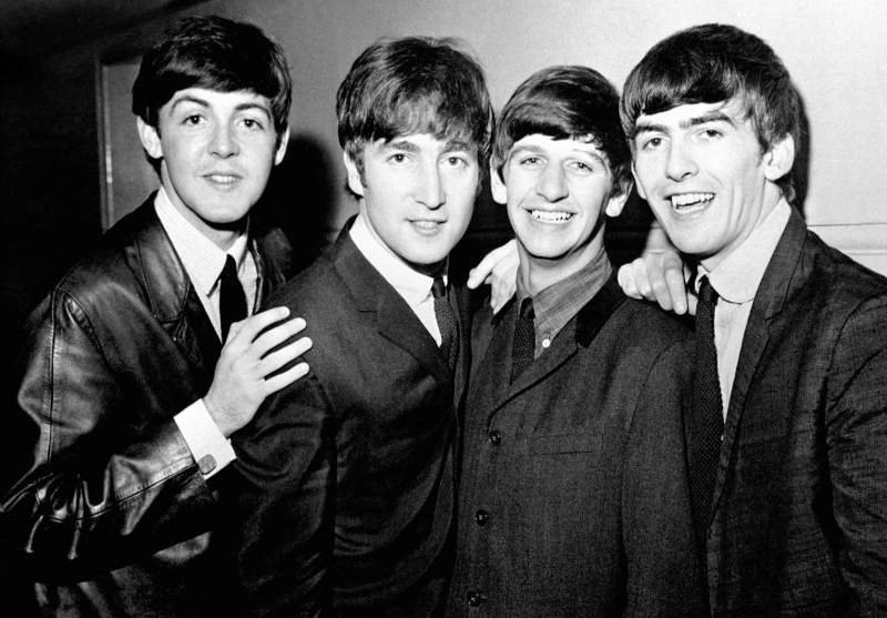 A Bunch Of Men Posing In A Black And White Image